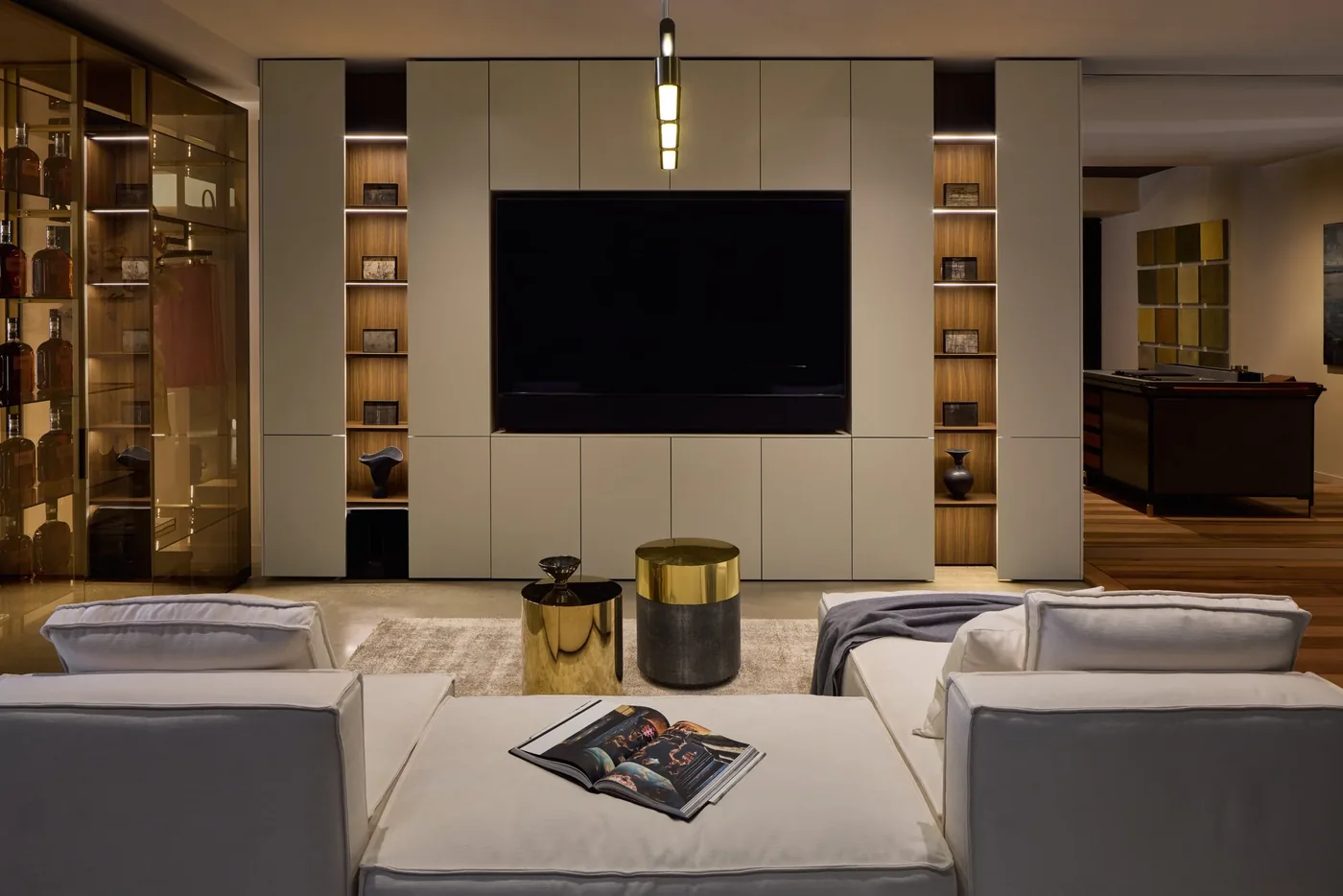 Lacquered media wall with walnut shelving