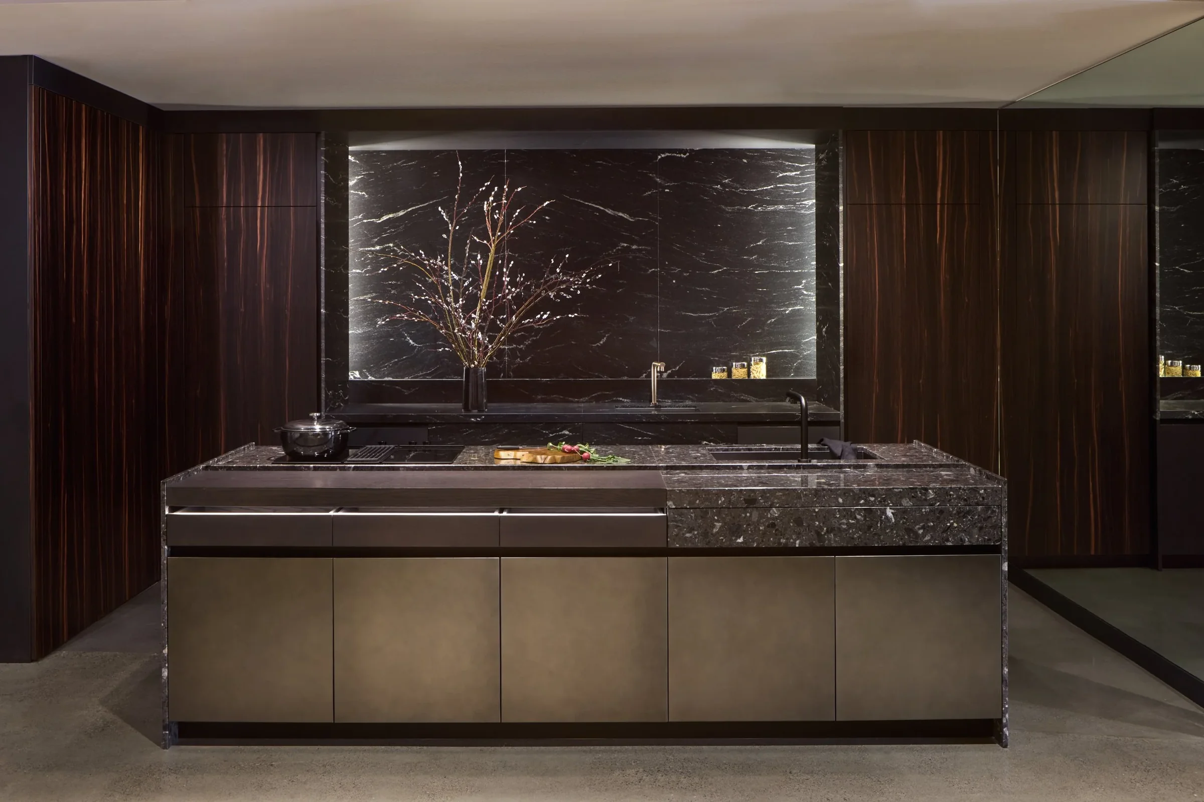 Dark stone kitchen island and full-height cabinetry in the SCIC San Francisco showroom