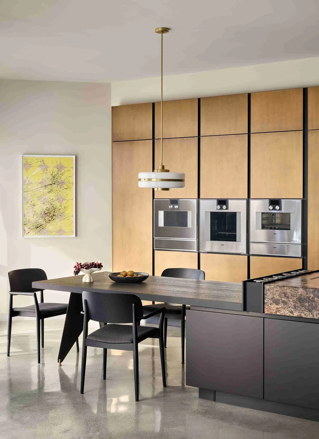 Showroom kitchen with tall appliance wall